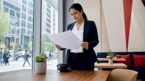 Businesswoman reviewing corporate relocation plans