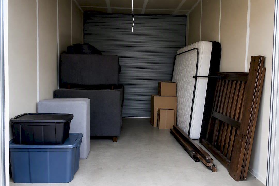 Medium storage unit with couch and boxed furniture
